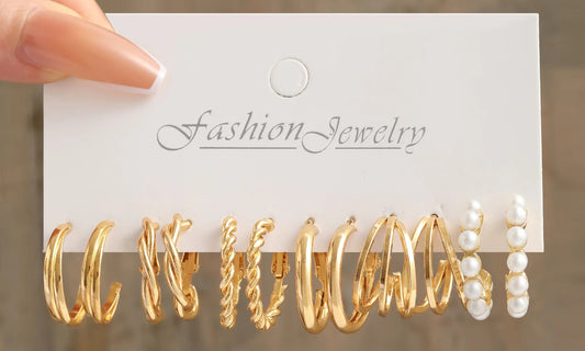 Gold tone earrings set 7